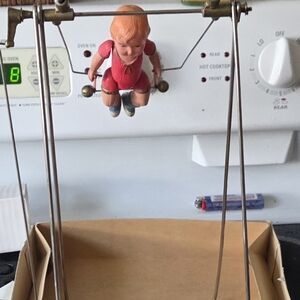 Classic Swinging Action Figure - Red and Tan